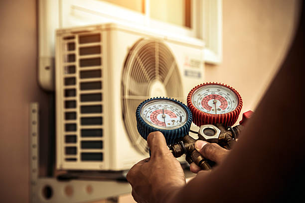 Professional Air Conditioning Service technician working in Chesterfield, IN